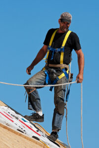 Certifications and training chimney Repair A Technichian in the roof top.