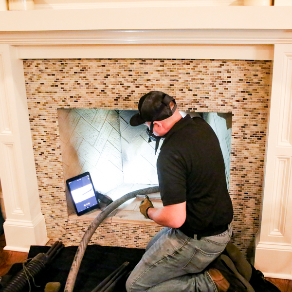 Damaged chimney crown before repair by Midwest Chimney Repair