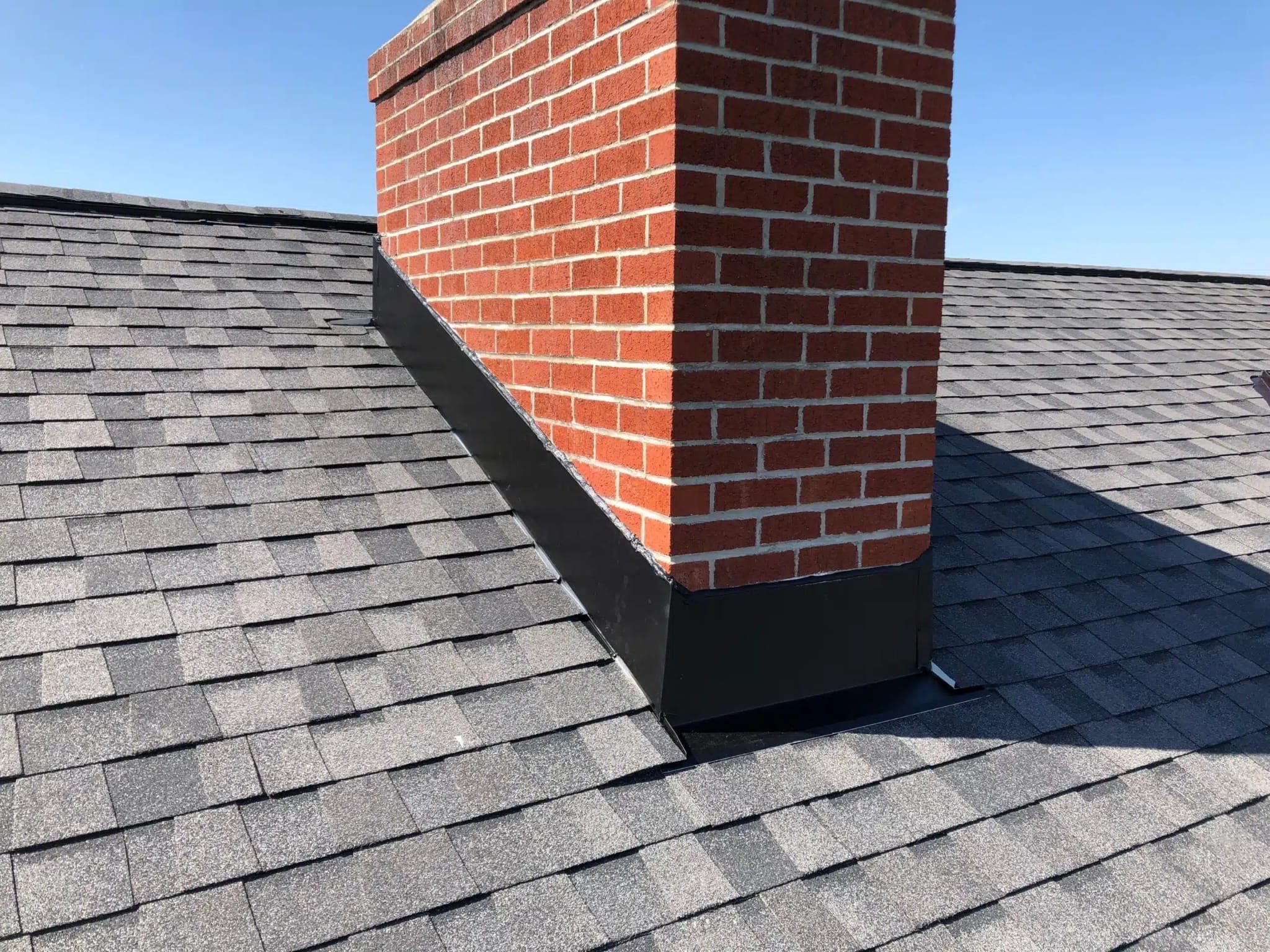 Damaged chimney crown before repair by Midwest Chimney Repair