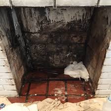 Damaged chimney crown before repair by Midwest Chimney Repair