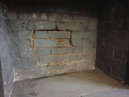 Damaged chimney crown before repair by Midwest Chimney Repair